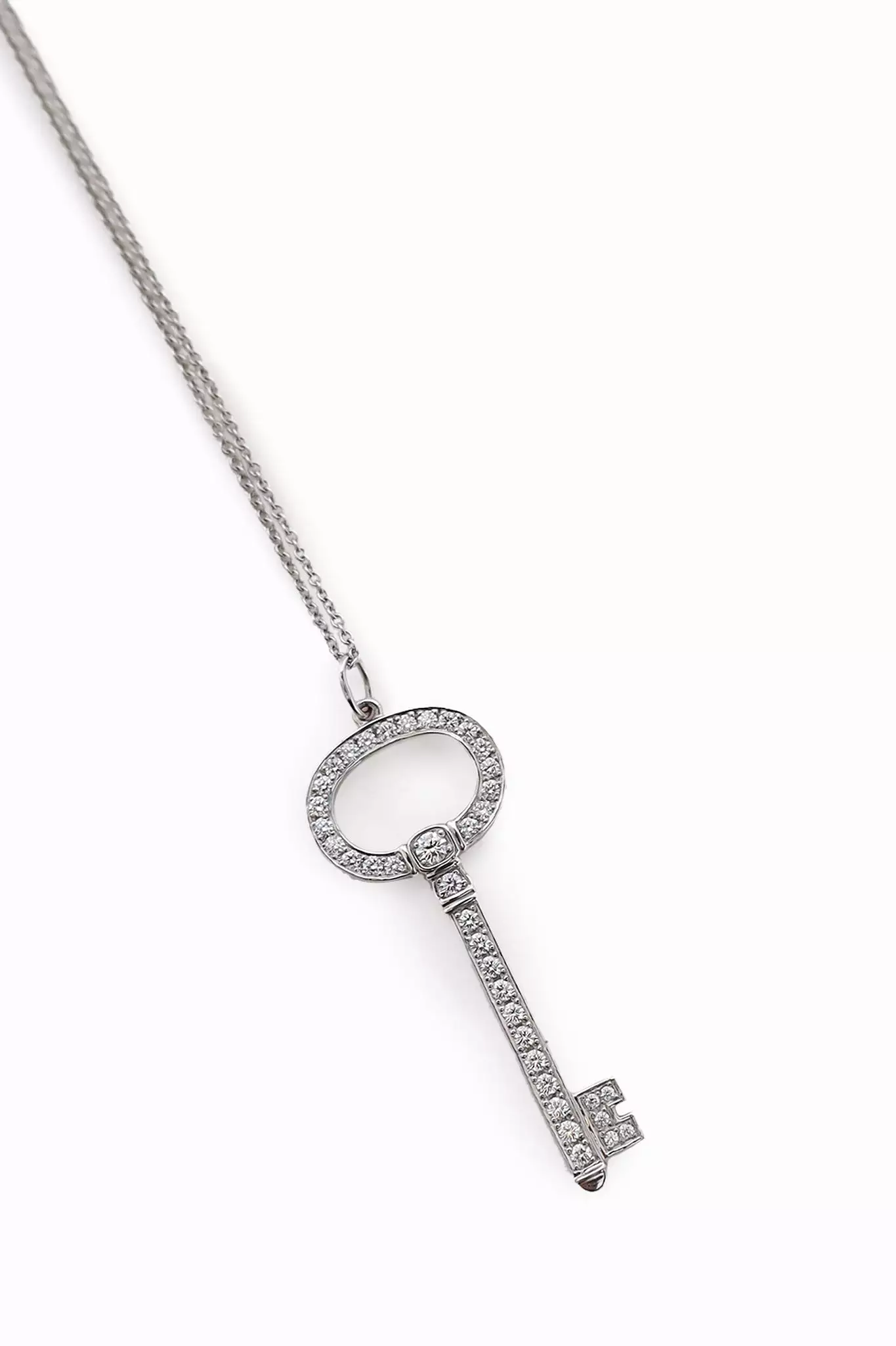 Tiffany & Co. Platinum Diamond Oval Key Pendant Necklace